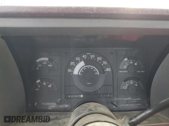 ✅ 1990 GMC Sierra 2500 • VIN: 1GTFC24K8LE514419 • Lot: 57265335. Wystawiony na Copart z przebiegiem 162 045 mil. Bezpłatny archiwum sprzedaży aukcyjnych z USA i szczegółowy raport historii pojazdu na DreamBid. Zdjęcie 9.