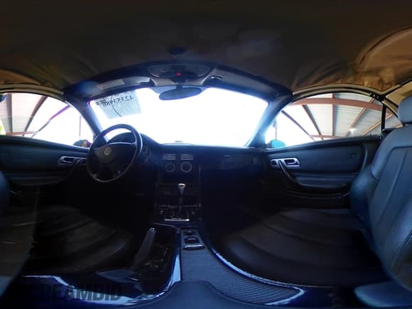 ✅ 2002 Mercedes-Benz SLK 230 Kompressor • VIN: WDBKK49F32F252115 • Lot: 42353986. Listed on IAAI with 192,789 mi. Free auction sales archive from the USA and detailed vehicle history report at DreamBid. Image 18.