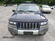 ✅ 2004 Jeep Grand Cherokee Laredo • VIN: 1J4GW48S64C160831 • Lot: 61920005. Wystawiony na Copart z przebiegiem 135 243 mil. Bezpłatny archiwum sprzedaży aukcyjnych z USA i szczegółowy raport historii pojazdu na DreamBid. Zdjęcie 5.