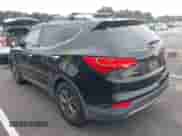 2016 Hyundai Santa Fe z VIN 5XYZUDLB4GG372753, wystawiony jako IAAI lot #43239818 z przebiegiem 134 901 mil mil oraz . Historia ofert i sprzedaży dostępna na DreamBid. Obrazek 3.