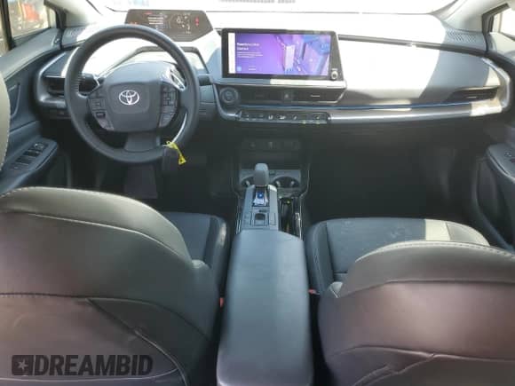 2024 Toyota Prius LE с VIN JTDACAAU3R3017518, выставлен на аукционе Copart как лот 70948625 с пробегом 51 151 миль миль и Списание • Salvage title. История ставок и продаж доступна на DreamBid. Изображение 8.