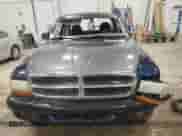 2003 Dodge Dakota Sport z VIN 1D7HG32N43S328884, wystawiony jako Copart lot #85985644 z przebiegiem 141 779 mil mil oraz Nie do naprawy • Non repairable. Historia ofert i sprzedaży dostępna na DreamBid. Obrazek 5.