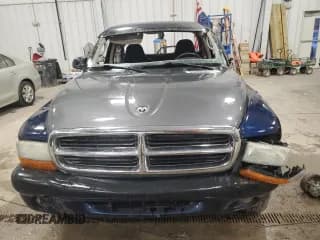 ✅ 2003 Dodge Dakota Sport • VIN: 1D7HG32N43S328884 • Lot: 85985644. Wystawiony na Copart z przebiegiem 141 779 mil. Bezpłatny archiwum sprzedaży aukcyjnych z USA i szczegółowy raport historii pojazdu na DreamBid. Zdjęcie 5.