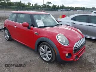 ✅ 2015 MINI Hardtop • VIN: WMWXM5C53F3A04882 • Lot: 43575061. Listed on IAAI with 64,650 mi. Free auction sales archive from the USA and detailed vehicle history report at DreamBid. Image 1.