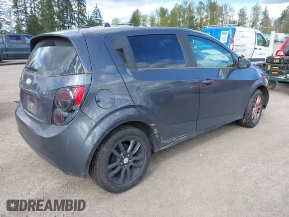2013 Chevrolet Sonic LT with VIN 1G1JD6SG1D4175273, listed as a IAAI auction lot 42088533 with 108,974 mi miles and . Bid and sale history available at DreamBid. Image 4.