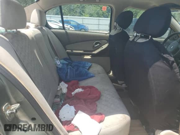 2005 Chevrolet Malibu LS z VIN 1G1ZT54855F267384, wystawiony jako Copart lot #79014734 z przebiegiem 337 940 mil mil oraz Szkoda całkowita • Salvage title. Historia ofert i sprzedaży dostępna na DreamBid. Obrazek 11.