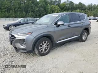 ✅ 2019 Hyundai Santa Fe SE • VIN: 5NMS23AD6KH092076 • Lot: 70301244. Wystawiony na Copart z przebiegiem 120 644 mil. Bezpłatny archiwum sprzedaży aukcyjnych z USA i szczegółowy raport historii pojazdu na DreamBid. Zdjęcie 1.