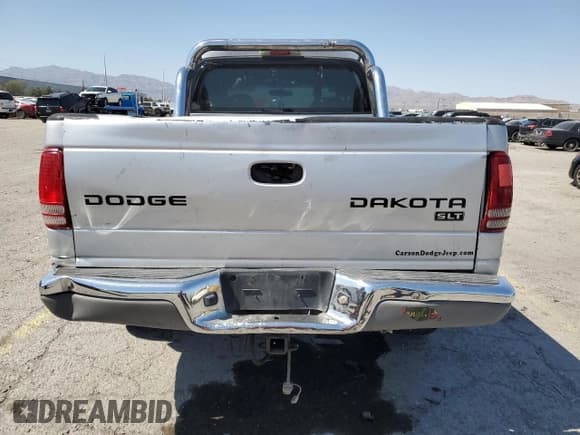 ✅ 2004 Dodge Dakota SLT • VIN: 1D7HG48N74S509797 • Lot: 57797055. Wystawiony na Copart z przebiegiem 214 275 mil. Bezpłatny archiwum sprzedaży aukcyjnych z USA i szczegółowy raport historii pojazdu na DreamBid. Zdjęcie 6.