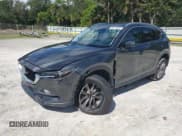 ✅ 2019 Mazda CX-5 Grand Touring • VIN: JM3KFADM7K0622051 • Lot: 86213585. Listed on Copart with 68,022 mi. Free auction sales archive from the USA and detailed vehicle history report at DreamBid. Image 1.