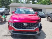 ✅ 2021 Hyundai Santa Fe SE • VIN: 5NMS14AJXMH336085 • Lot: 42301440. Listed on IAAI with 23,612 mi. Free auction sales archive from the USA and detailed vehicle history report at DreamBid. Image 12.