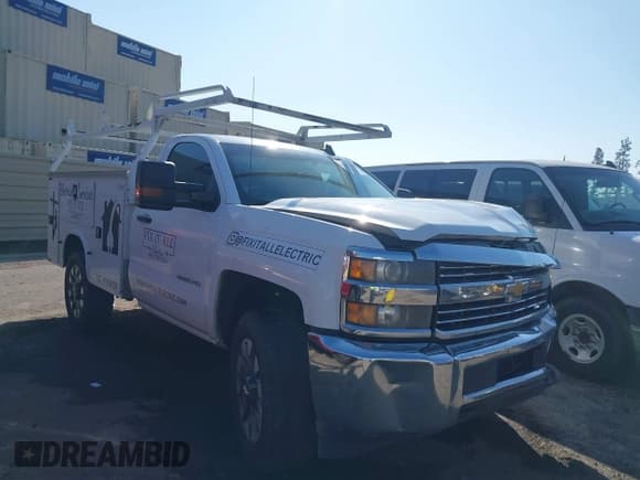 ✅ 2015 Chevrolet Silverado 2500HD Work Truck • VIN: 1GB0KUEG1FZ513743 • Лот: 43594246. Опубликован ранее на IAAI с пробегом 335 573 миль. Бесплатный доступ к архиву аукционных продаж из США и подробный отчёт об истории автомобиля на DreamBid. Изображение 1.