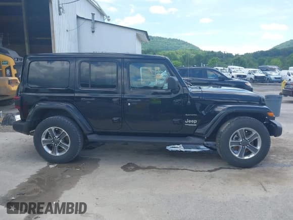 ✅ 2021 Jeep Wrangler Unlimited Sahara • VIN: 1C4HJXEN4MW610287 • Lot: 42538525. Listed on IAAI with 24,861 mi. Free auction sales archive from the USA and detailed vehicle history report at DreamBid. Image 14.