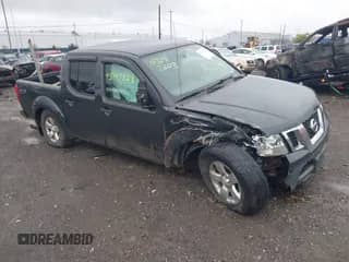 2012 Nissan Frontier SL z VIN 1N6AD0EV2CC433140, wystawiony jako IAAI lot #43147323 z przebiegiem 144 501 mil mil oraz . Historia ofert i sprzedaży dostępna na DreamBid. Obrazek 1.