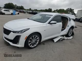 ✅ 2021 Cadillac CT5 Premium Luxury • VIN: 1G6DN5RKXM0144362 • Lot: 82373405. Wystawiony na Copart z przebiegiem 100 755 mil. Bezpłatny archiwum sprzedaży aukcyjnych z USA i szczegółowy raport historii pojazdu na DreamBid. Zdjęcie 1.