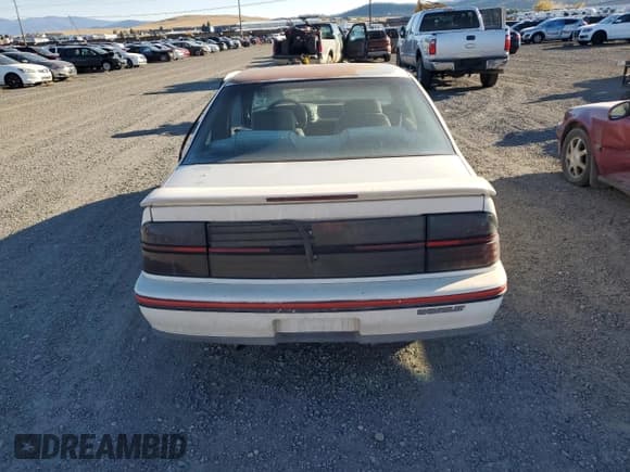 ✅ 1990 Chevrolet Beretta • VIN: 1G1LW14T1LE136918 • Лот: 72023874. Опубликован ранее на Copart с пробегом 71 009 миль. Бесплатный доступ к архиву аукционных продаж из США и подробный отчёт об истории автомобиля на DreamBid. Изображение 6.