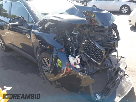 ✅ 2023 Toyota Corolla Cross XLE • VIN: 7MUEAAAGXPV065844 • Лот: 43357622. Опубликован ранее на IAAI с пробегом 43 099 миль. Бесплатный доступ к архиву аукционных продаж из США и подробный отчёт об истории автомобиля на DreamBid. Изображение 18.