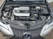 ✅ 2021 Lexus UX 250h F Sport • VIN: JTHR9JBH5M2041383 • Lot: 84017265. Wystawiony na Copart z przebiegiem 91 620 mil. Bezpłatny archiwum sprzedaży aukcyjnych z USA i szczegółowy raport historii pojazdu na DreamBid. Zdjęcie 12.