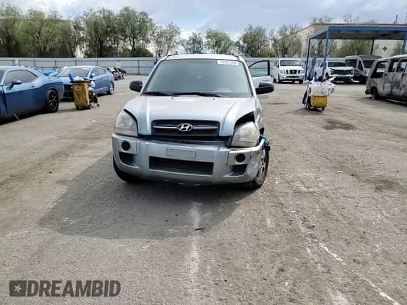 2005 Hyundai Tucson GL with VIN KM8JM12B95U080391, listed as a Copart auction lot 72551384 with 238,122 mi miles and Salvage title. Bid and sale history available at DreamBid. Image 11.