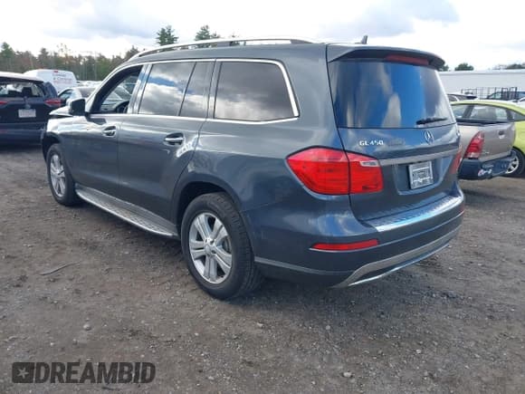 ✅ 2015 Mercedes-Benz GL 450 • VIN: 4JGDF6EE2FA543310 • Lot: 43634666. Listed on IAAI with 156,366 mi. Free auction sales archive from the USA and detailed vehicle history report at DreamBid. Image 3.