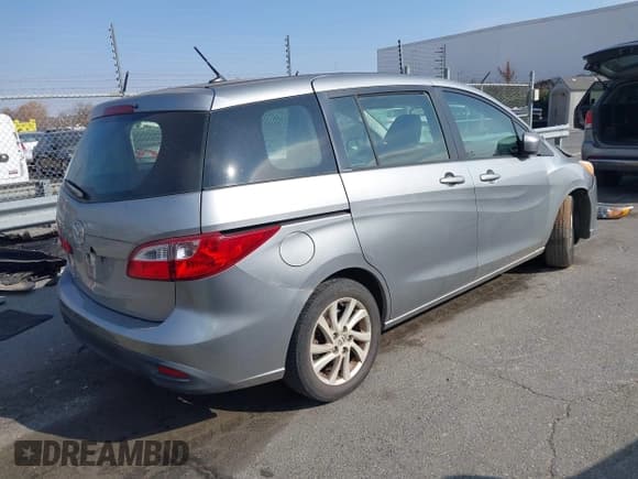 ✅ 2012 Mazda 5 Sport • VIN: JM1CW2BL6C0132196 • Lot: 43731507. Listed on IAAI with 250,136 mi. Free auction sales archive from the USA and detailed vehicle history report at DreamBid. Image 4.