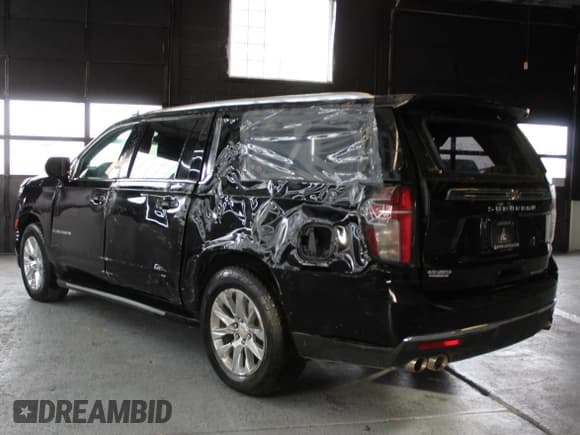 ✅ 2023 Chevrolet Suburban Premier • VIN: 1GNSCFKD6PR452020 • Lot: 90104625. Wystawiony na Copart z przebiegiem 39 600 mil. Bezpłatny archiwum sprzedaży aukcyjnych z USA i szczegółowy raport historii pojazdu na DreamBid. Zdjęcie 5.