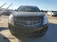 ✅ 2012 Cadillac SRX Performance Collection • VIN: 3GYFNBE33CS646165 • Lot: 90860355. Wystawiony na Copart z przebiegiem 157 539 mil. Bezpłatny archiwum sprzedaży aukcyjnych z USA i szczegółowy raport historii pojazdu na DreamBid. Zdjęcie 5.