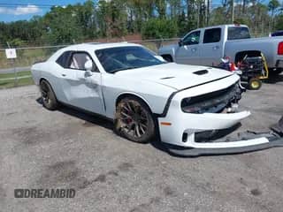 2016 Dodge Challenger SRT Hellcat z VIN 2C3CDZC98GH344394, wystawiony jako IAAI lot #43309335 z przebiegiem 64 278 mil mil oraz . Historia ofert i sprzedaży dostępna na DreamBid. Obrazek 1.