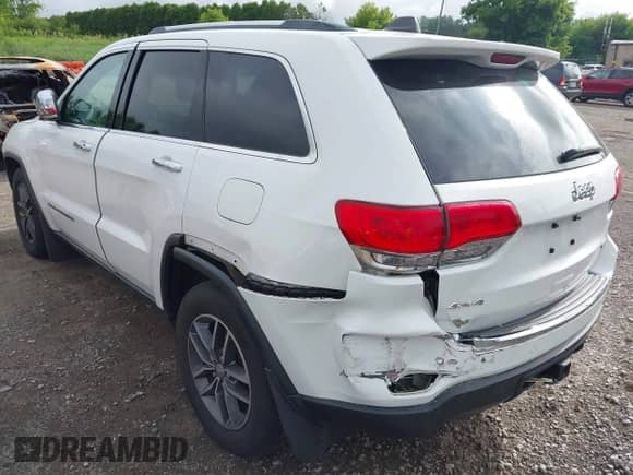 2018 Jeep Grand Cherokee Sterling z VIN 1C4RJFBG1JC489610, wystawiony jako IAAI lot #42689926 z przebiegiem 107 763 mil mil oraz . Historia ofert i sprzedaży dostępna na DreamBid. Obrazek 3.