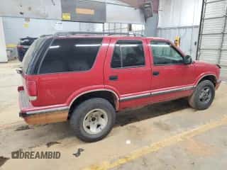 1995 Chevrolet Blazer z VIN 1GNDT13W2SK212802, wystawiony jako Copart lot #84792554 z przebiegiem 186 206 mil mil oraz Szkoda całkowita • Salvage title. Historia ofert i sprzedaży dostępna na DreamBid. Obrazek 3.
