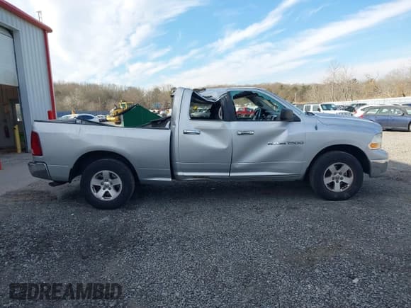 ✅ 2012 Ram 1500 SLT • VIN: 1C6RD7GP5CS129813 • Lot: 41616107. Listed on IAAI with 127,023 mi. Free auction sales archive from the USA and detailed vehicle history report at DreamBid. Image 13.