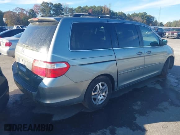 ✅ 2005 Honda Odyssey EX • VIN: 5FNRL38495B099823 • Lot: 43684097. Listed on IAAI with 275,157 mi. Free auction sales archive from the USA and detailed vehicle history report at DreamBid. Image 4.