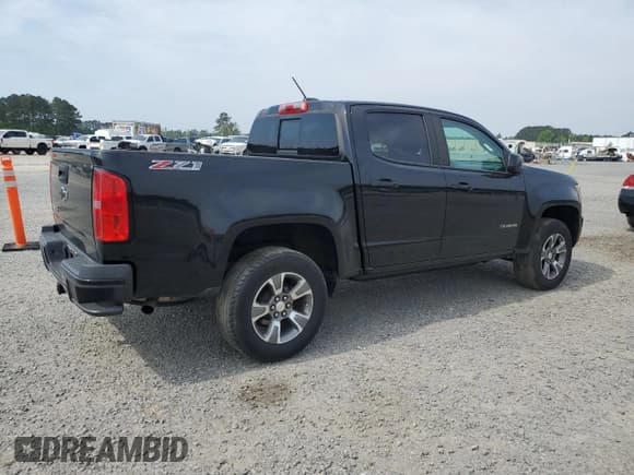✅ 2018 Chevrolet Colorado 4WD Z71 • VIN: 1GCGTDEN9J1192144 • Лот: 53122125. Опубликован ранее на Copart с пробегом 170 032 миль. Бесплатный доступ к архиву аукционных продаж из США и подробный отчёт об истории автомобиля на DreamBid. Изображение 3.