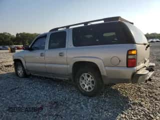 2004 Chevrolet Suburban Z71 с VIN 3GNFK16Z04G213507, выставлен на аукционе Copart как лот 74241244 с пробегом 276 037 миль миль и Списание • Salvage title. История ставок и продаж доступна на DreamBid. Изображение 2.