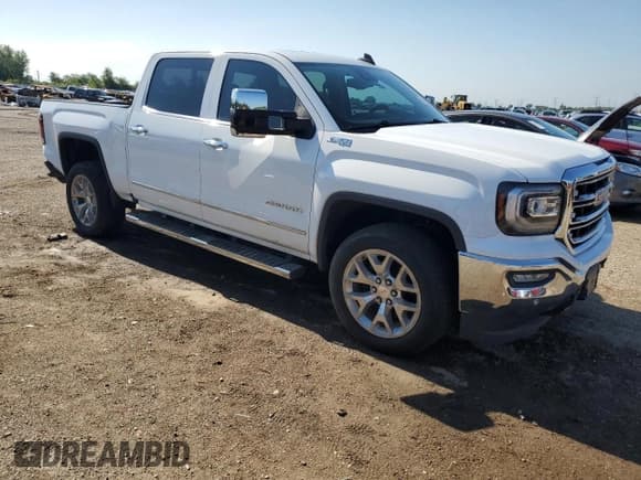 ✅ 2018 GMC Sierra 1500 SLT • VIN: 3GTU2NEC5JG571931 • Лот: 70195255. Опубликован ранее на Copart с пробегом 94 194 миль. Бесплатный доступ к архиву аукционных продаж из США и подробный отчёт об истории автомобиля на DreamBid. Изображение 4.