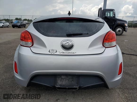 ✅ 2013 Hyundai Veloster w/Gray Int • VIN: KMHTC6AD8DU092672 • Lot: 63773024. Wystawiony na Copart z przebiegiem 169 452 mil. Bezpłatny archiwum sprzedaży aukcyjnych z USA i szczegółowy raport historii pojazdu na DreamBid. Zdjęcie 6.