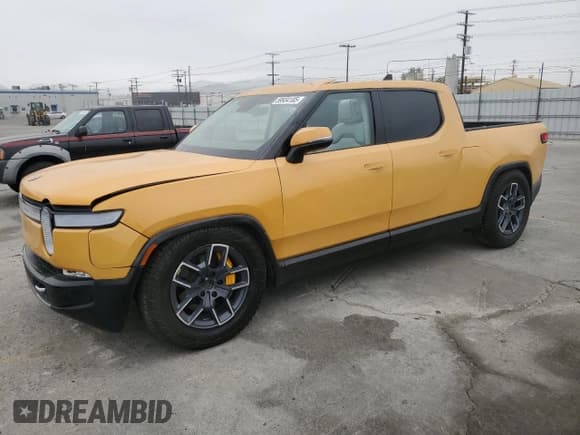 ✅ 2022 Rivian R1T Launch Edition • VIN: 7FCTGAAL2NN011755 • Lot: 59934185. Wystawiony na Copart z przebiegiem 12 261 mil. Bezpłatny archiwum sprzedaży aukcyjnych z USA i szczegółowy raport historii pojazdu na DreamBid. Zdjęcie 1.