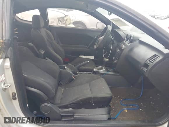 2008 Hyundai Tiburon GS с VIN KMHHM66D68U264666, выставлен на аукционе IAAI как лот 41970123 с пробегом 186 448 миль миль и . История ставок и продаж доступна на DreamBid. Изображение 5.