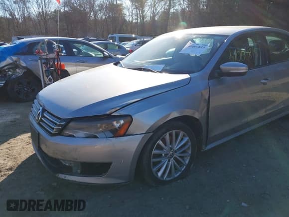 ✅ 2014 Volkswagen Passat S • VIN: 1VWAP7A30EC008863 • Lot: 41004815. Wystawiony na IAAI z przebiegiem 219 881 mil. Bezpłatny archiwum sprzedaży aukcyjnych z USA i szczegółowy raport historii pojazdu na DreamBid. Zdjęcie 6.