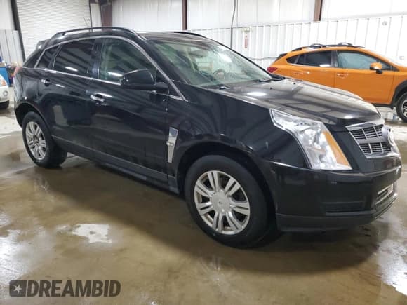 ✅ 2011 Cadillac SRX • VIN: 3GYFNGEY5BS650192 • Lot: 92796655. Wystawiony na Copart z przebiegiem 110 391 mil. Bezpłatny archiwum sprzedaży aukcyjnych z USA i szczegółowy raport historii pojazdu na DreamBid. Zdjęcie 4.