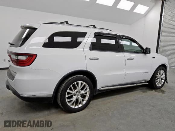 ✅ 2014 Dodge Durango Citadel • VIN: 1C4SDHET4EC344550 • Lot: 65362915. Listed on Copart with 106,789 mi. Free auction sales archive from the USA and detailed vehicle history report at DreamBid. Image 3.