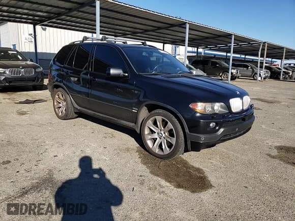 ✅ 2005 BMW X5 4.8is • VIN: 5UXFA93515LE83489 • Lot: 87840265. Listed on Copart with 131,786 mi. Free auction sales archive from the USA and detailed vehicle history report at DreamBid. Image 12.