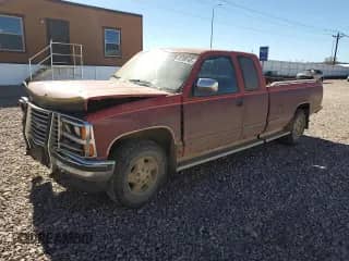 1989 Chevrolet Silverado 1500 with VIN 2GCEK19K4K1170122, listed as a Copart auction lot 82206165 with 165,004 mi miles and Salvage title. Bid and sale history available at DreamBid. Image 1.