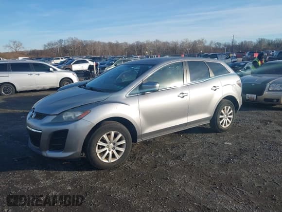 ✅ 2011 Mazda CX-7 i Touring • VIN: JM3ER2CMXB0387513 • Lot: 43824673. Wystawiony na IAAI z przebiegiem 116 708 mil. Bezpłatny archiwum sprzedaży aukcyjnych z USA i szczegółowy raport historii pojazdu na DreamBid. Zdjęcie 2.