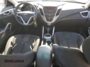 ✅ 2012 Hyundai Veloster w/Red Int • VIN: KMHTC6AD9CU039848 • Lot: 74922324. Listed on Copart with 125,887 mi. Free auction sales archive from the USA and detailed vehicle history report at DreamBid. Image 8.