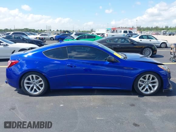 ✅ 2013 Hyundai Genesis Coupe 2.0T • VIN: KMHHT6KD1DU090198 • Lot: 42297169. Wystawiony na IAAI z przebiegiem 69 501 mil. Bezpłatny archiwum sprzedaży aukcyjnych z USA i szczegółowy raport historii pojazdu na DreamBid. Zdjęcie 13.