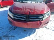 ✅ 2013 Volkswagen Tiguan S • VIN: WVGAV3AX2DW063067 • Lot: 41638749. Listed on IAAI with 150,115 mi. Free auction sales archive from the USA and detailed vehicle history report at DreamBid. Image 6.