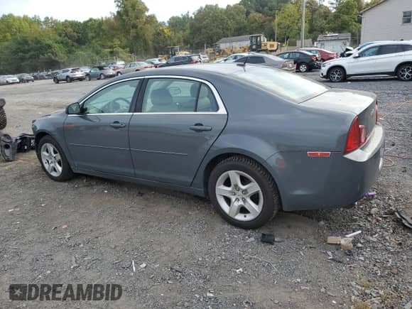 2009 Chevrolet Malibu 1LS z VIN 1G1ZG57B69F134358, wystawiony jako Copart lot #72314554 z przebiegiem 194 373 mil mil oraz Szkoda całkowita • Salvage title. Historia ofert i sprzedaży dostępna na DreamBid. Obrazek 2.