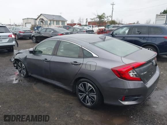 ✅ 2018 Honda Civic EX-T • VIN: JHMFC1F34JX029310 • Lot: 43770255. Listed on IAAI with 71,655 mi. Free auction sales archive from the USA and detailed vehicle history report at DreamBid. Image 3.