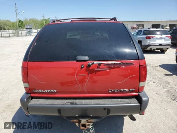 1996 Chevrolet Blazer z VIN 1GNCT18W2TK201658, wystawiony jako Copart lot #56384935 z przebiegiem 111 957 mil mil oraz Czysty tytuł • Clean title. Historia ofert i sprzedaży dostępna na DreamBid. Obrazek 6.