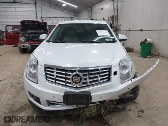✅ 2014 Cadillac SRX Performance Collection • VIN: 3GYFNFE36ES654593 • Lot: 43702163. Wystawiony na IAAI z przebiegiem 90 611 mil. Bezpłatny archiwum sprzedaży aukcyjnych z USA i szczegółowy raport historii pojazdu na DreamBid. Zdjęcie 13.